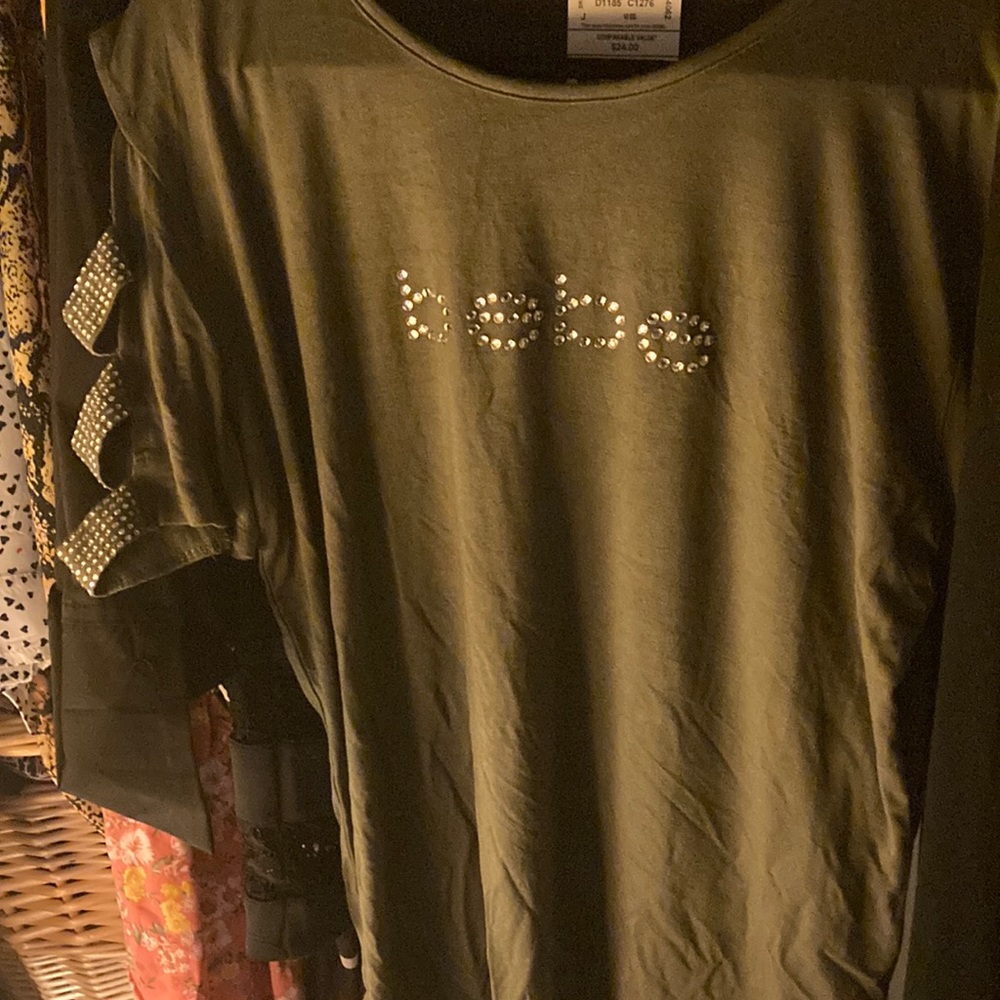 Size L Bebe top dark green with bling cut out sleeves